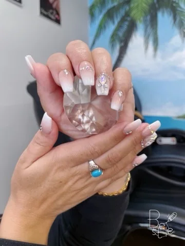 Pearl details nail design supplied by Hip Hop Nails