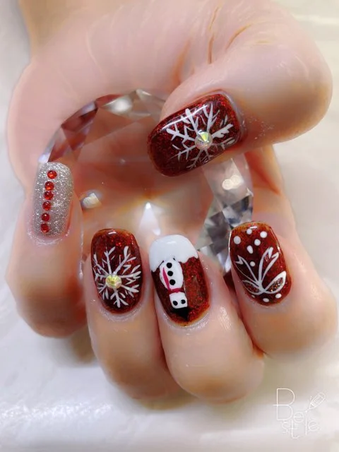 Snowflake sparkle nail design supplied by Hip Hop Nails